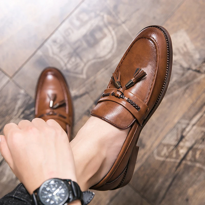 Mocasines de piel con borlas